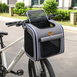 sac de transport fixé sur un vélo pour chien