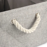 Détail des poignées en corde résistantes du panier de rangement personnalisé pour chien et chat.