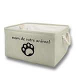 Panier de rangement personnalisé avec une patte d'animal et le prénom de votre chien ou de votre chat, idéal pour organiser les jouets, accessoires, laisses et harnais.