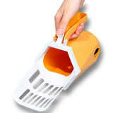 Pelle à litière pour chat avec sac intégré en cours d'utilisation, permettant de nettoyer la litière rapidement, proprement et sans contact direct avec les déchets.
